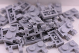 Light Bluish Gray / 60470 TCM Bricks Plate, Modified 1 x 2 with Clips Horizontal